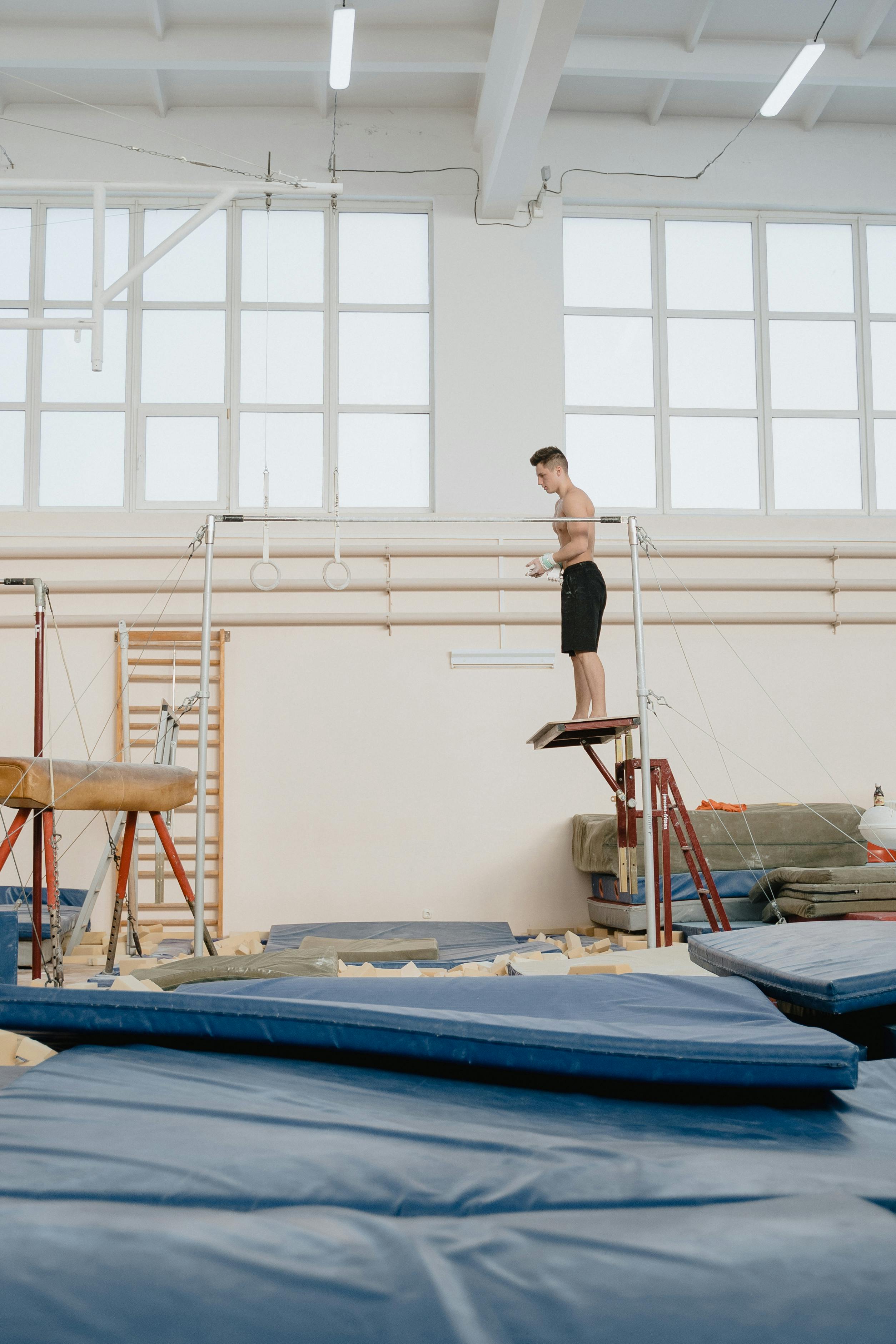Children practicing gymnastics on balance beam